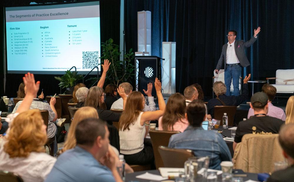 Ian Vacin presenting on stage at Karbon Next 2025